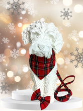 Dog Mannequin wearing a handmade festive Red Tartan dog collar, bandana and lead that is perfect for Christmas. Made in the UK and washable.