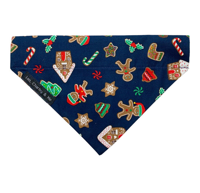 Gingerbread Village dog bandana in navy cotton poplin.  Handmade in the UK and washable 