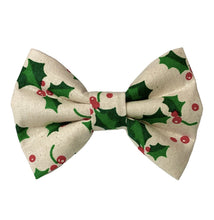 Christmas Holly Berry dog bow tie made from a natural cotton printed with holly leaves and berries. Handmade and washable.