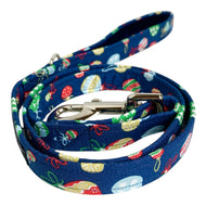 Handmade festive Liberty print Tumbling Baubles dog lead that is perfect for Christmas. Made in the UK and washable.