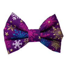 Christmas Snowflakes dog bow tie made from a purple cotton printed with gold, purple and turquoise snowflakes. Handmade and washable.