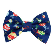 Handmade festive Liberty print Tumbling Baubles dog bow tie that is perfect for Christmas. Made in the UK and washable.