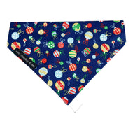 Handmade festive Liberty print Tumbling Baubles dog bandana that is perfect for Christmas. Made in the UK and washable.