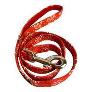 Handmade Red Christmas Snowstorm dog lead. Made in the UK and washable. Matching Christmas bow tie, bandana and collar available.