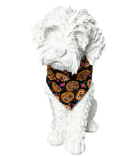 Halloween pumpkin dog bandana made from soft cotton poplin. Beautifully printed with scary pumpkin faces. Handmade in the UK. Washable