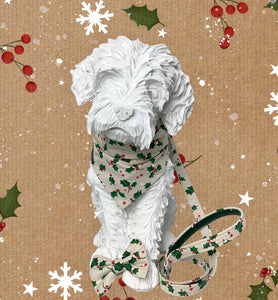 Dog mannequin wearing the Christmas Holly Berry dog collar made from a natural cotton printed with holly leaves and berries. Handmade and washable.