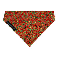 Handmade Red and gold metallic Holly print dog bandana. Made in the UK and washable. Christmas bandana