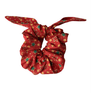 Christmas Star print scrunchie to match the festive collection of dog collar, bow and bandana. Handmade in England and washable. 