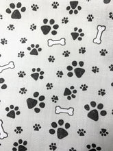 Paw and Bone print fitted cotton face masks. Grey with black paw prints. Washable and reusable, made in the U.K. 