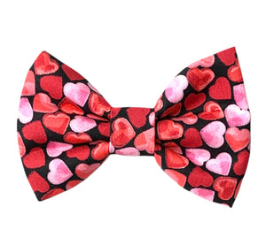 Valentine dog bow tie. Show the world how much you love your dog with this beautiful handmade dog bow tie in a heart print. Made in the U.K. 