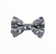 Handmade dog bow tie in cotton print. Made by hand in the U.K. and washable. Silver grey cotton poplin printed with tiny white sheep. 