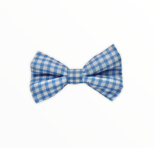 Handmade dog bow tie in cotton print. Made by hand in the U.K. and washable. Blue gingham cotton poplin dog bow tie.