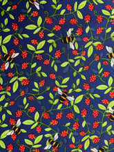 Strawberry and bee print fabric with foliage