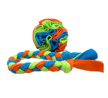 Plaited fleece tug toy and snuffle ball in bright colours. Handmade in the UK