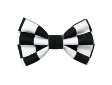 Charley in Paris black and white checker board print dog bow tie with other accessories of collar, bandana, lead and collar flower with bucket hats and scrunchies for owners available. Hand made in the UK. 