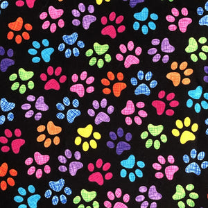 Rainbow Paw print cotton dog bandana with matching hair scrunchie for owners on National Twin with your dog day