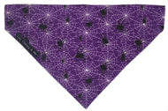 Cotton dog bandana in purple for Halloween with spiders on. Handmade and washable. 