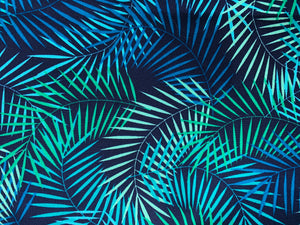 Turquoise green and blue tropical palm leaf print with navy background 