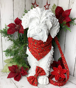 Dog mannequin wearing the Christmas Star collar, bandana and lead. Pictured with the matching flower. Handmade in England and washable.