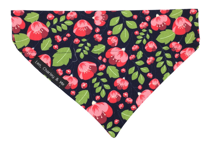 Soft cotton poplin dog bandana with pink fuchsias and green foliage on a navy background. Hand made in the U.K. and washable.  