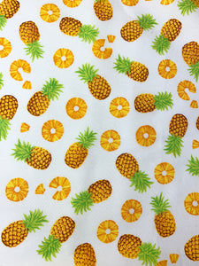Pineapple print fabric with cream background 