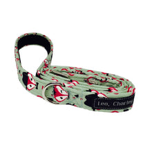 Foxy Gentleman sage green fabric dog lead printed with foxy faces. Handmade and washable.