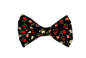 Cute black poplin dog bow tie covered in pretty pink flowers. Handmade in the U.K. and washable.