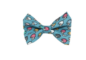 Handmade dog bow tie in cotton print. Made by hand in the U.K. and washable. Turquoise cotton with hedgehog print. 