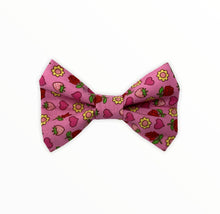 Handmade dog bow tie in cotton print. Made by hand in the U.K. and washable. Pretty pink bow tie with Roses and strawberries print 