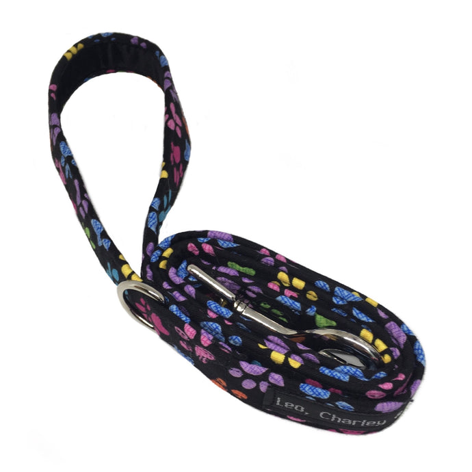 Rainbow Paws print cotton poplin dog lead with soft purple velvet lined handle. Hand made and washable.  
