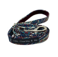 Paisley print dog lead with a navy blue velvet lined handle. Made in the UK and washable.