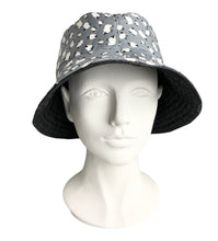 Stylish handmade reversible bucket hat in black denim and Silver Sheep print. Matches our range of Silver Sheep dog accessories. Bang on trend in monochrome fabric 