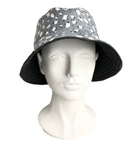 Stylish handmade reversible bucket hat in black denim and Silver Sheep print. Matches our range of Silver Sheep dog accessories. Bang on trend in monochrome fabric 