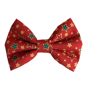 Cute handmade cotton bow tie in cherry red cotton poplin printed with a multitude of stars in dark red, gold and green.  Such a dapper look for the festive season and beyond!  Matching accessories available for owners so you can Twin With Your Dog. Handmade in the UK