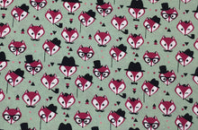 Foxy Gentleman sage green fabric dog lead printed with foxy faces. Handmade and washable. 