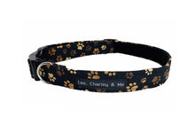 Soft handmade cotton poplin dog collar with muddy paw prints. Made in the UK and washable 