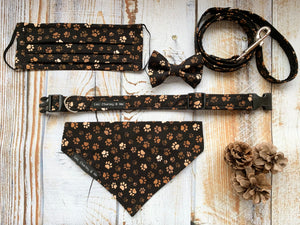 Soft handmade cotton poplin dog collar, bandana, lead and bow tie in a muddy paw print fabric. Made in the UK and washable. Spring collection from Leo Charley & Me